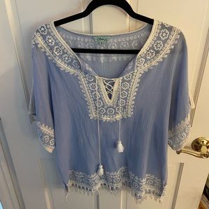 Super cute light blue top with mirror detailing